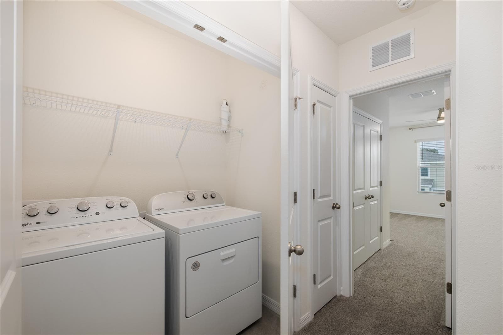 Laundry area upstairs with quick access to bedrooms - 11166 CRESCENT DEER DR, LAND O LAKES