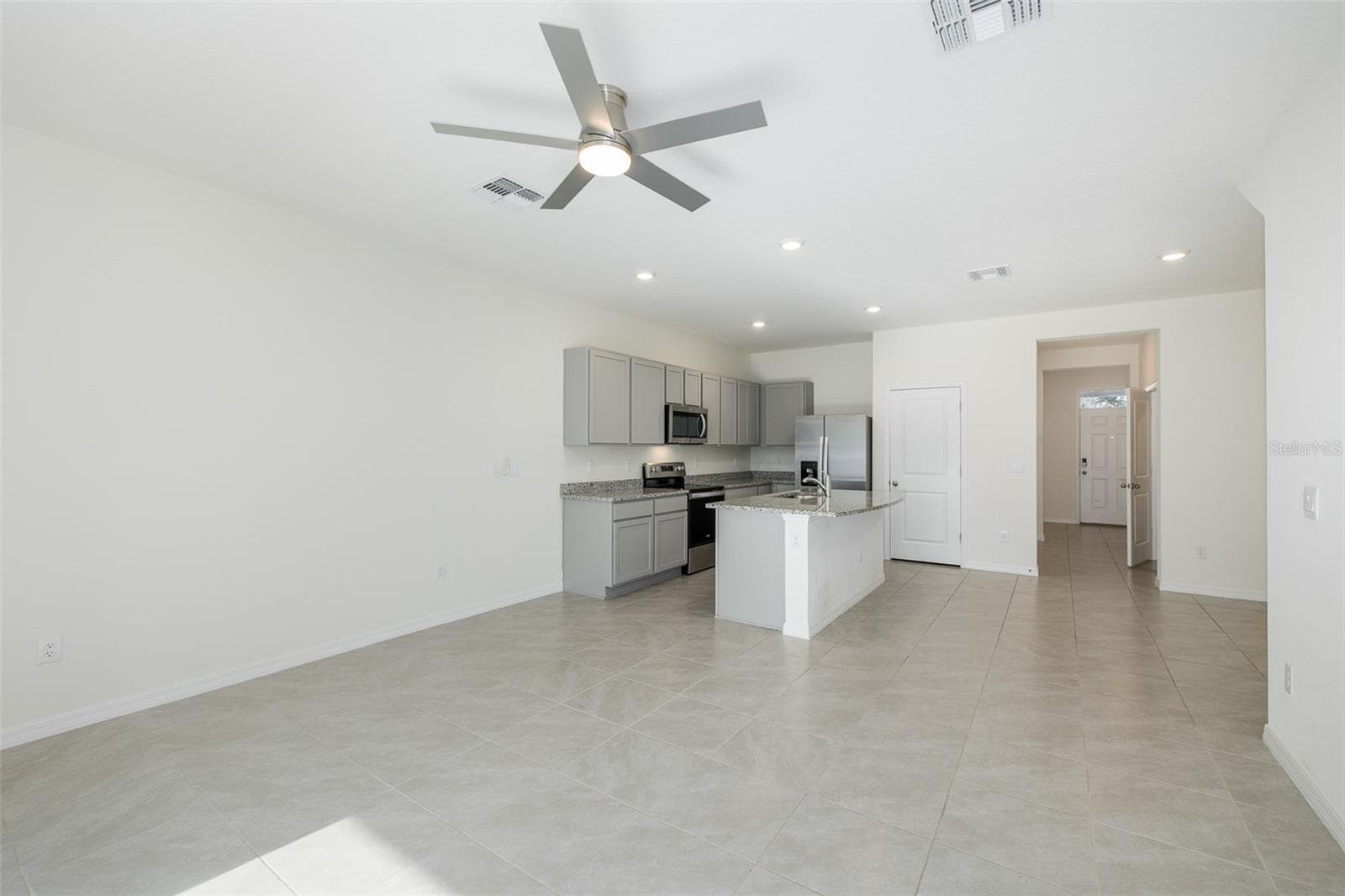 Living Room/Kitchen Combo - 11166 CRESCENT DEER DR, LAND O LAKES