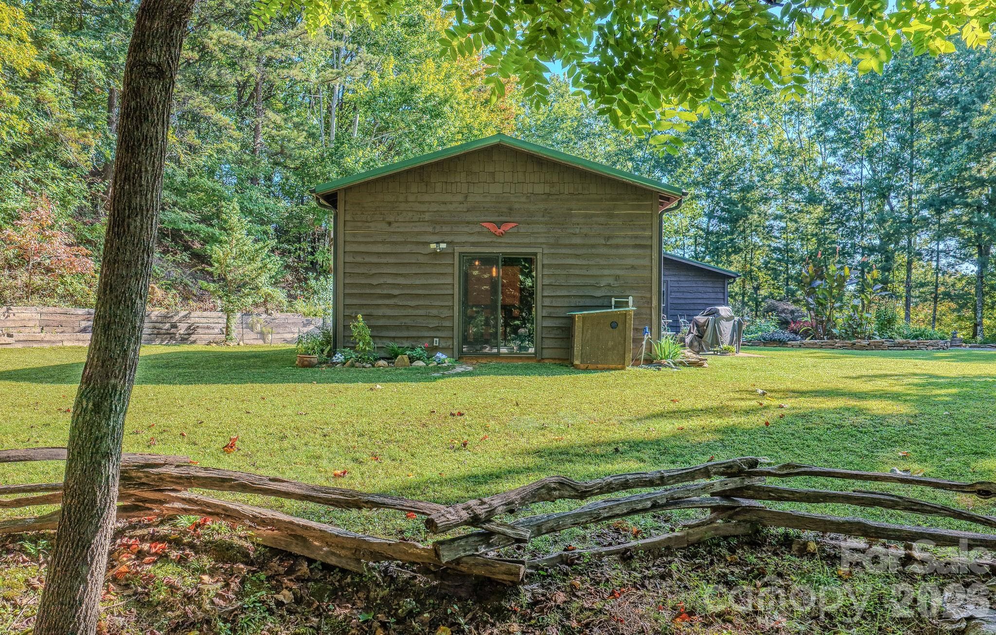 Room for gardening, entertaining, and play, from the fairy garden to the fenced backyard. - 54 Winning Way, Old Fort