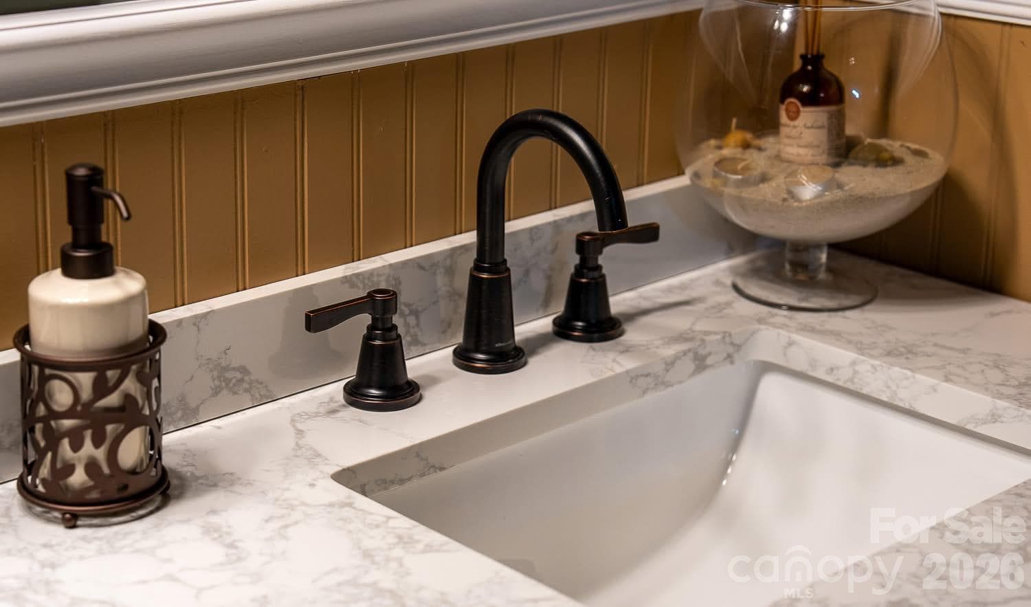 Two full baths, one with a spa-style walk-in shower and dual shower heads for a daily retreat. - 54 Winning Way, Old Fort