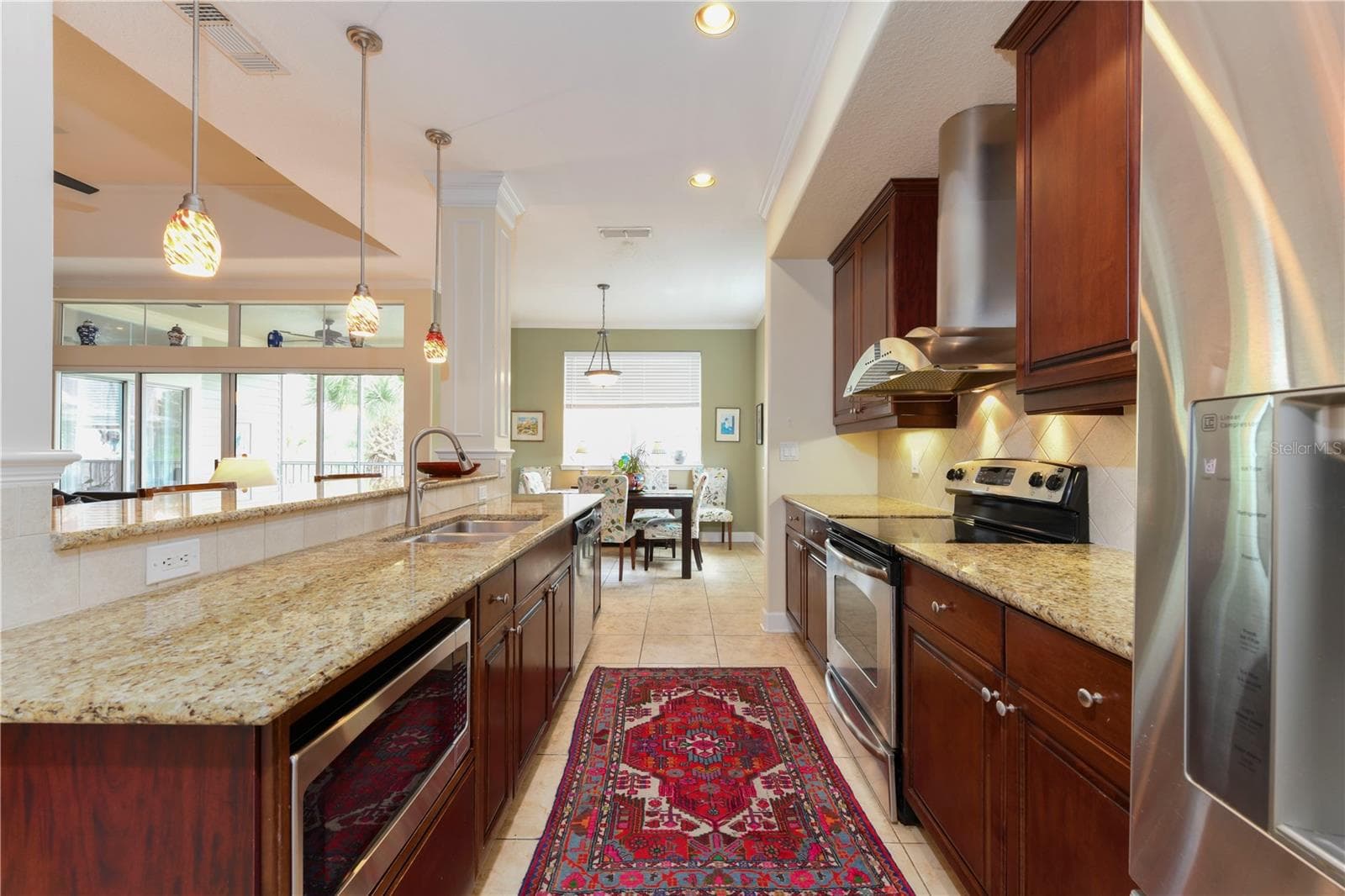 Galley Kitchen. Under counter microwave. - 8049 TYBEE CT #8049, UNIVERSITY PARK