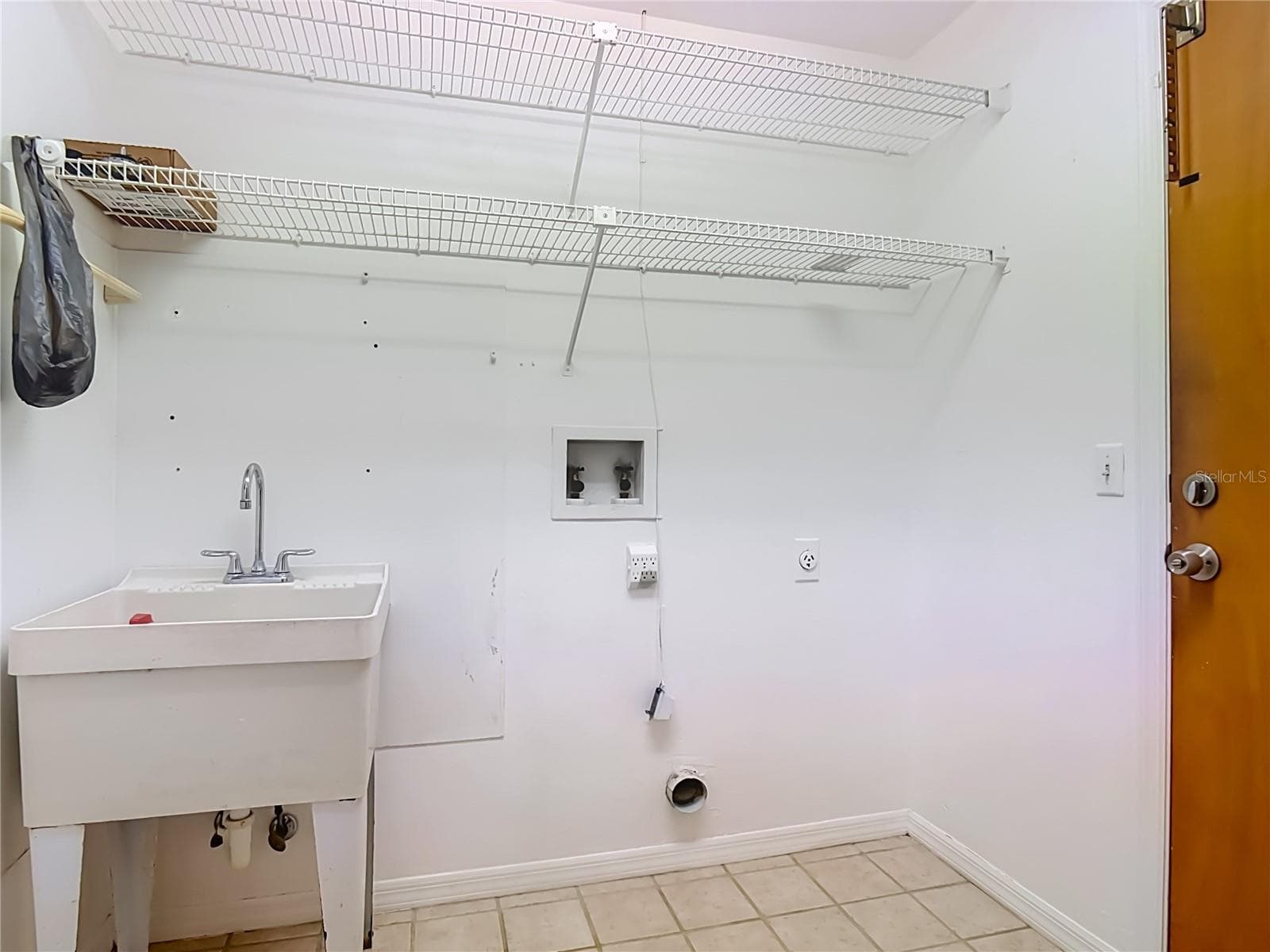 Inside laundry room - 5812 NOB HILL BLVD, PORT ORANGE