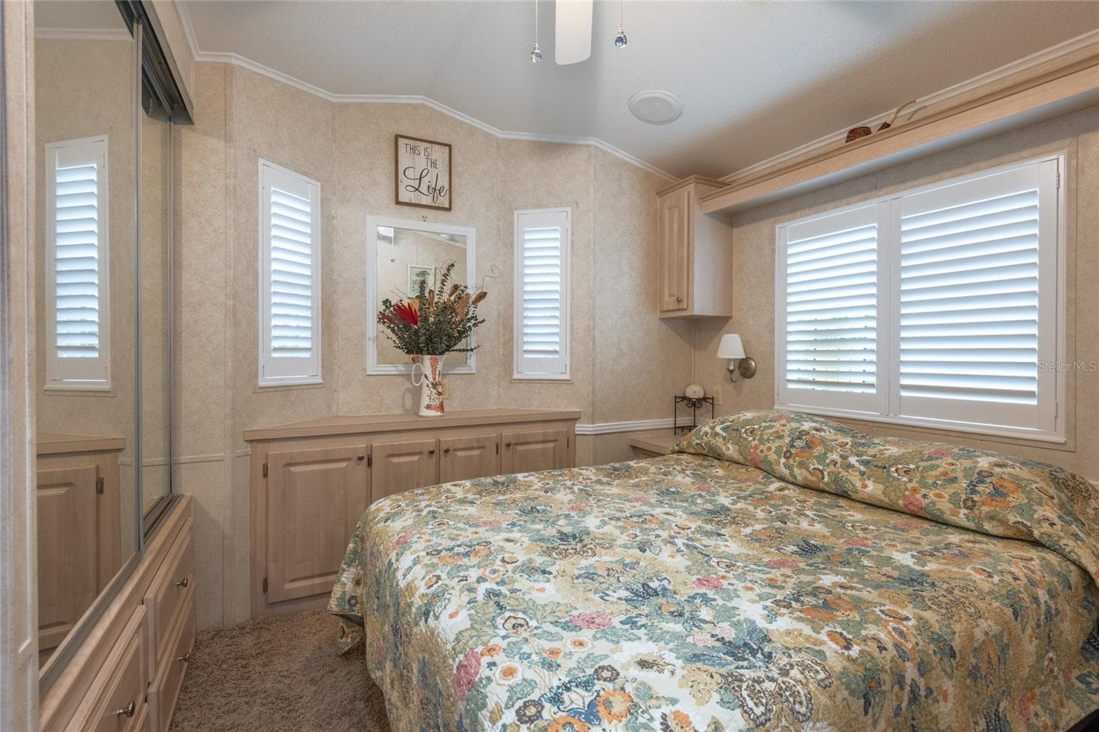 Plantation Shutters adorn the windows. - 6544 LA MESA RD, LAND O LAKES