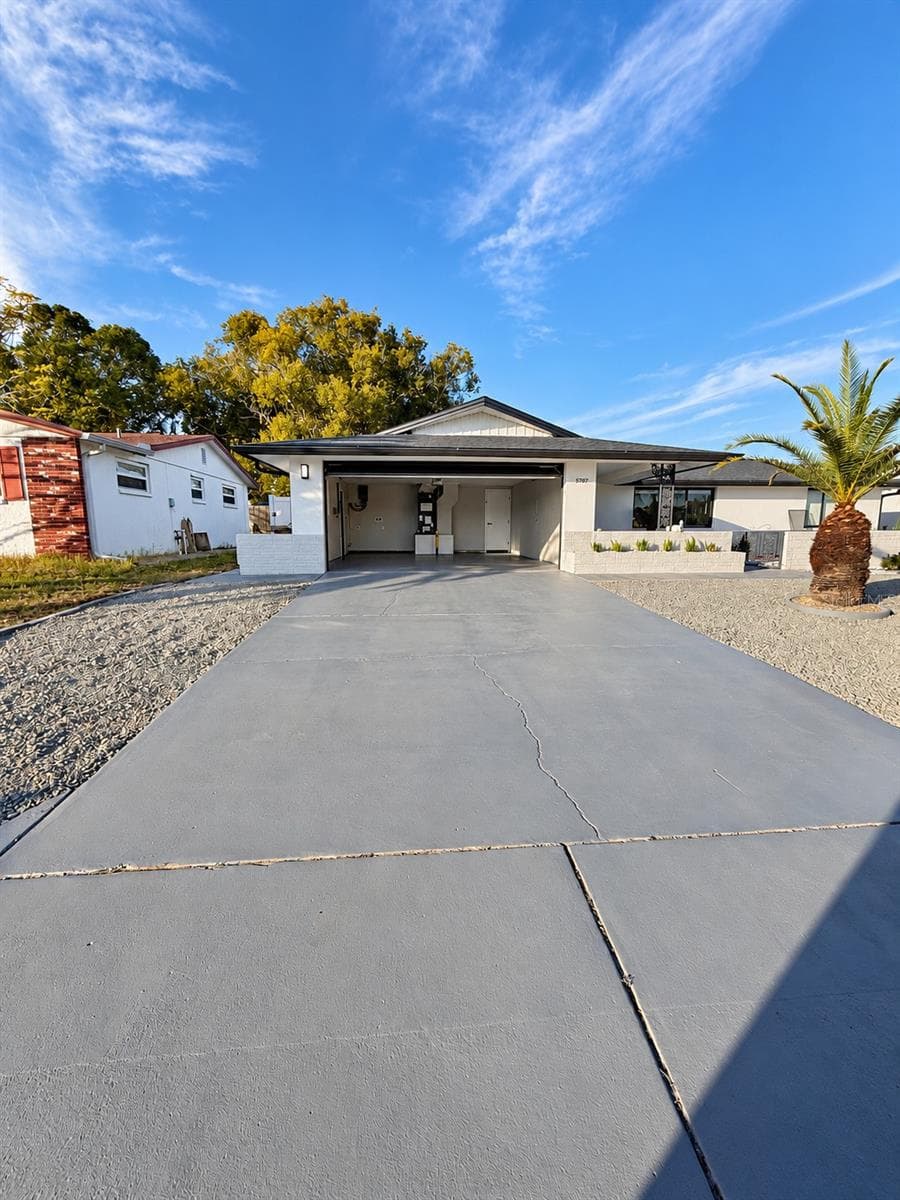 Front of house from driveway - 5707 PERKIN DR, NEW PORT RICHEY