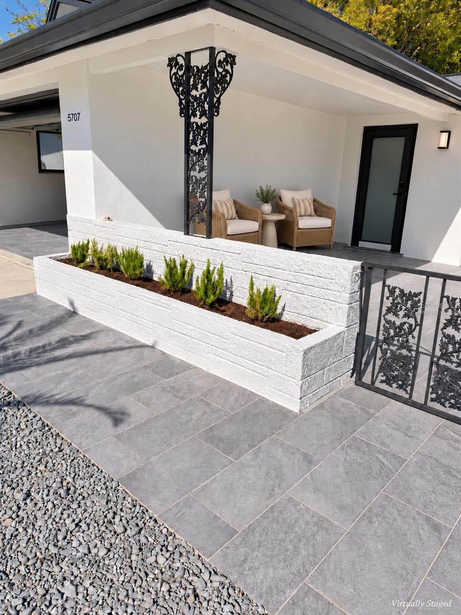 Front patio virtually staged - 5707 PERKIN DR, NEW PORT RICHEY