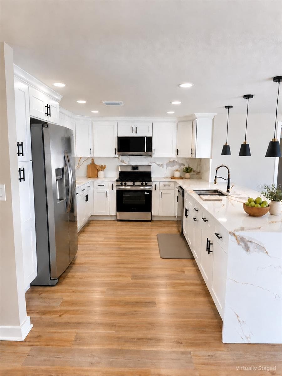Huge kitchen virtually staged - 5707 PERKIN DR, NEW PORT RICHEY