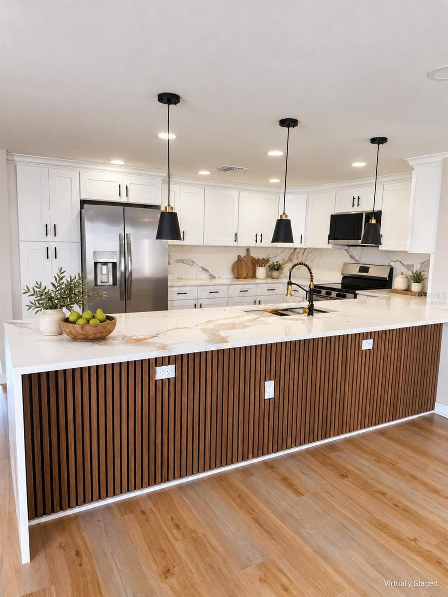 Kitchen virtually staged - 5707 PERKIN DR, NEW PORT RICHEY