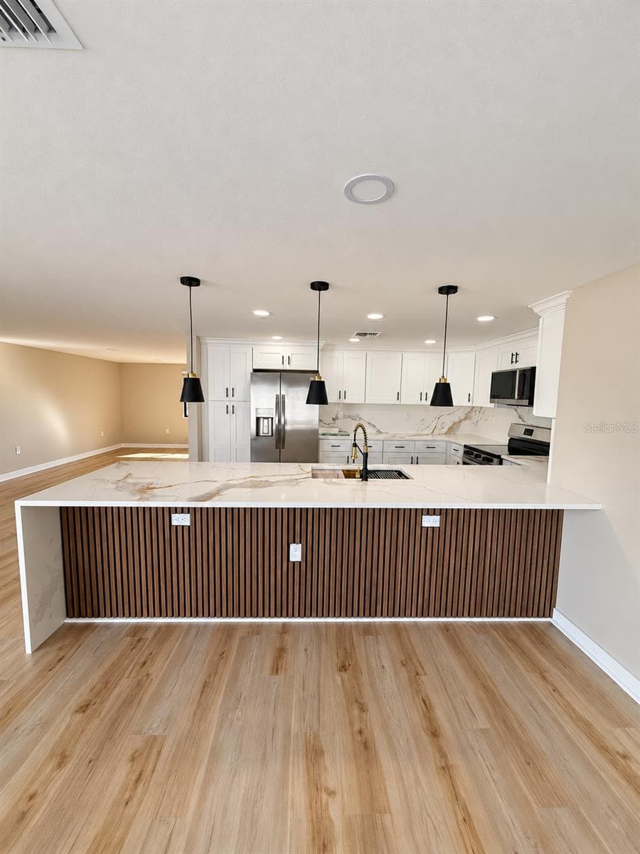 Kitchen bar - 5707 PERKIN DR, NEW PORT RICHEY