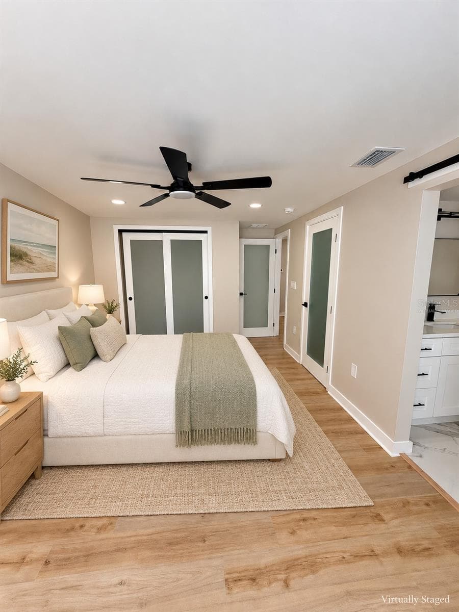 Primary bedroom virtually staged - 5707 PERKIN DR, NEW PORT RICHEY