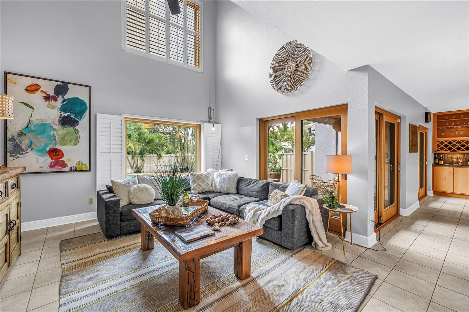 The large picture windows and three sets of hurricane-impact sliding doors were professionally replaced by Pella. This property is located in an area that remained undamaged during recent weather events. - 990 SAN CARLOS CT NE, ST PETERSBURG