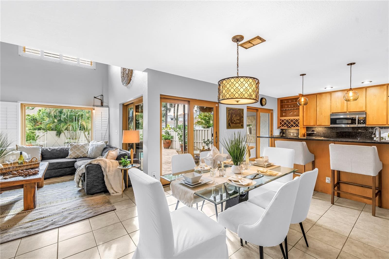 Open Floorplan with barside entertainment from the Chef. Serve on the bar and dine by the fireplace....Or Al Fresco - 990 SAN CARLOS CT NE, ST PETERSBURG