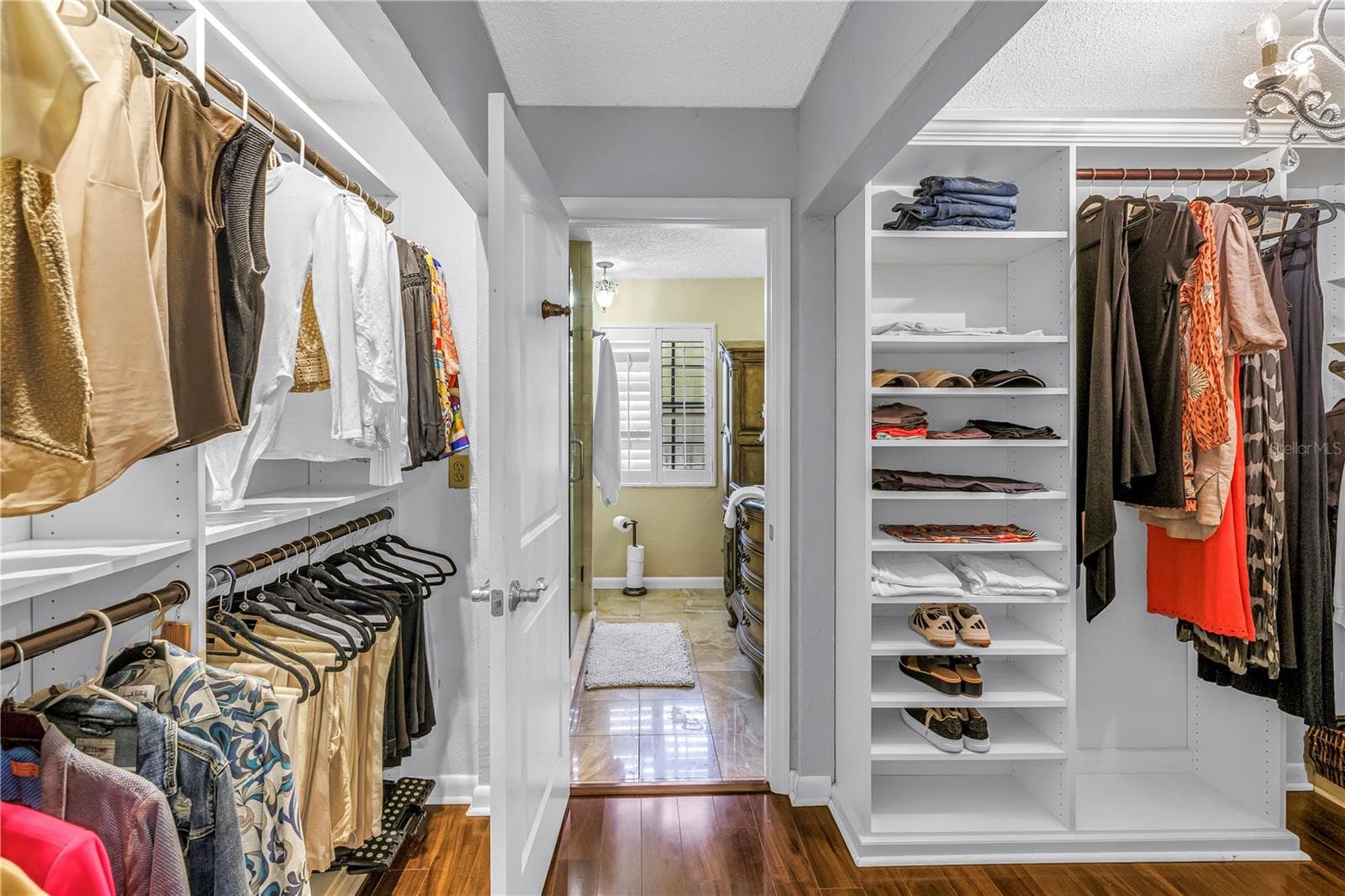 Expanded closet space for the primary bedroom - 990 SAN CARLOS CT NE, ST PETERSBURG