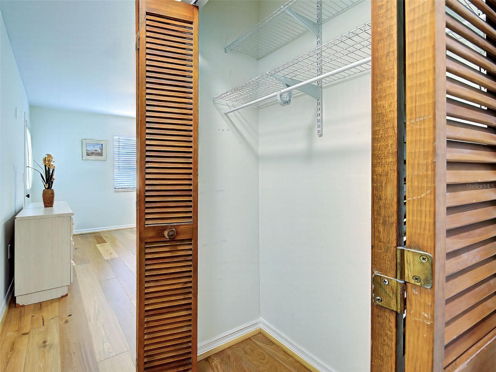 PRIMARY BEDROOM CLOSET - 6796 GASPARILLA PINES BLVD #13, ENGLEWOOD