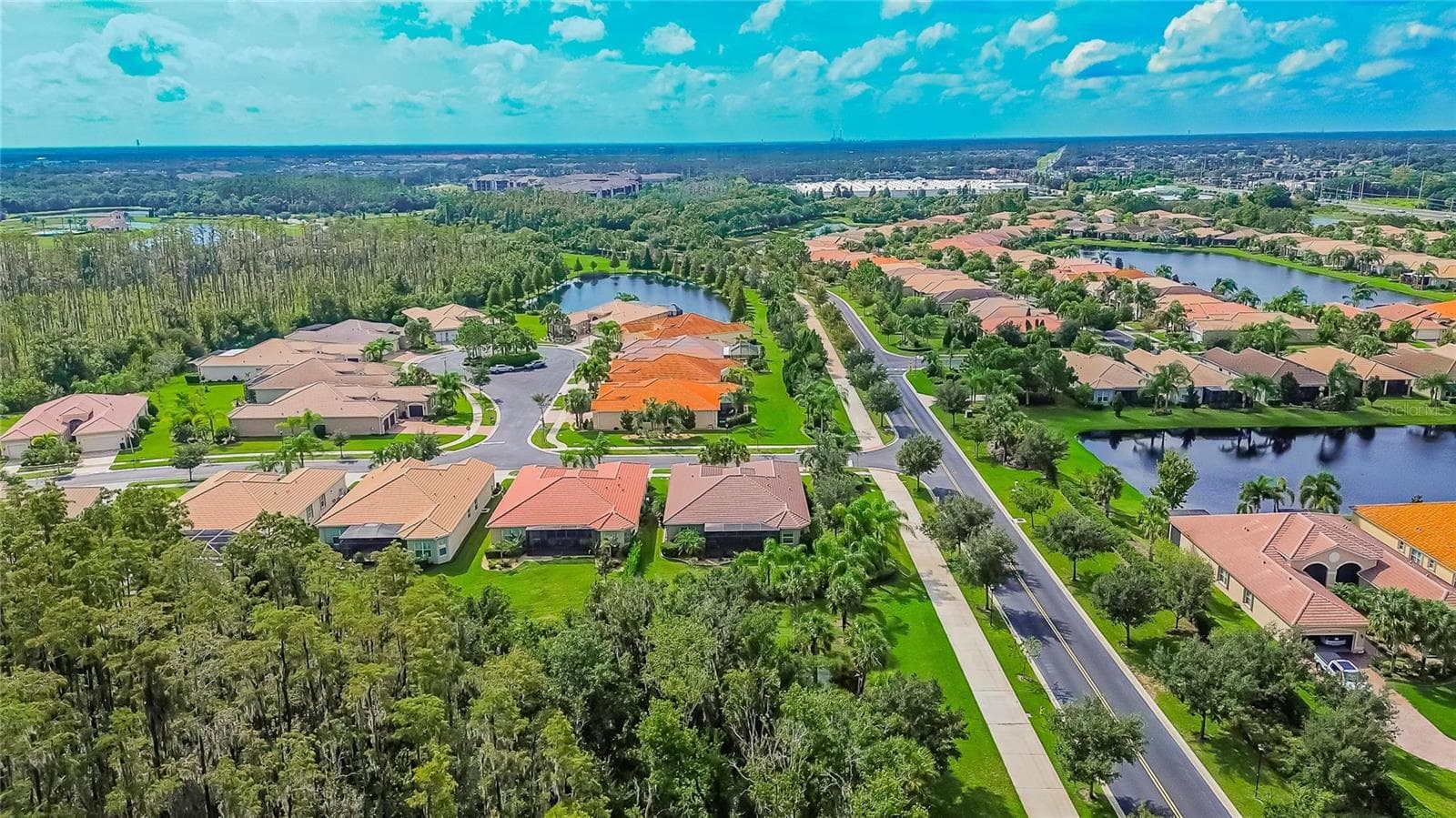 Exterior Rear Aerial Toward South Community Gate Entrance - 5002 EMERALD ISLE DR, WIMAUMA