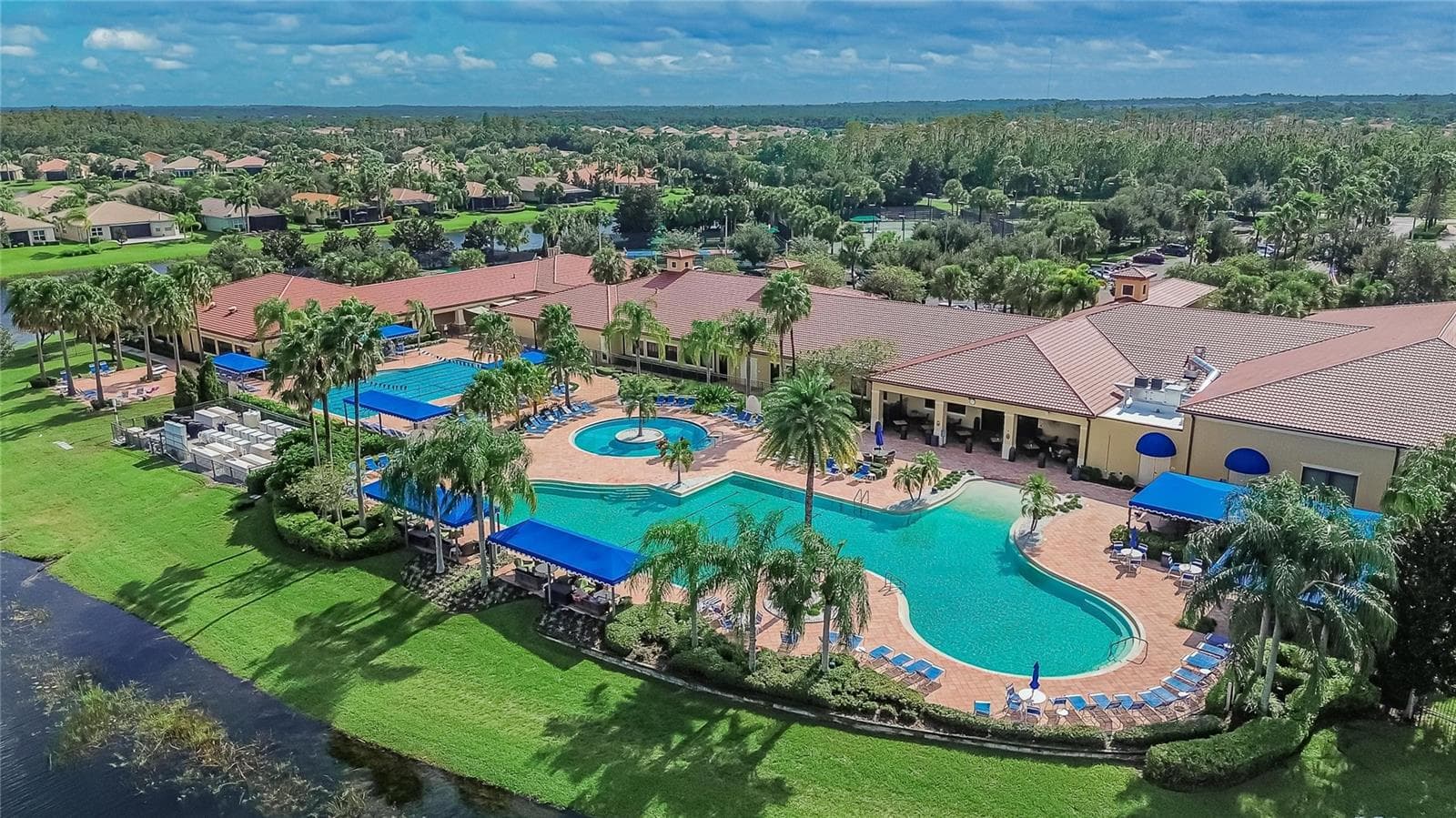 Aerial View Community Lap, Resistance & Zero Entry Pools - 15906 COBBLE MILL DR, WIMAUMA