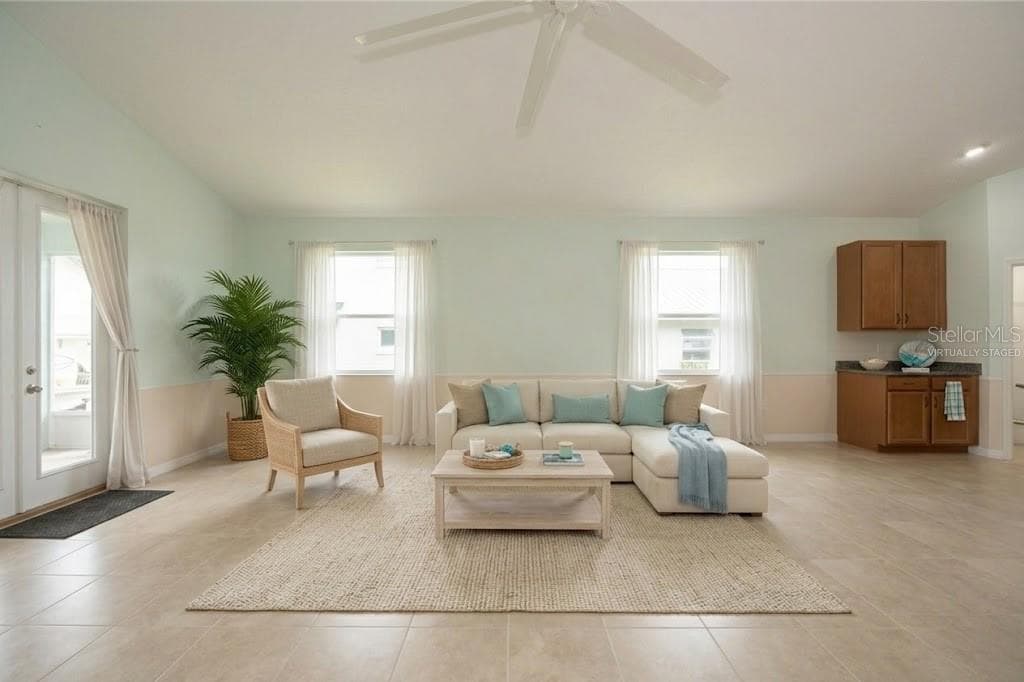 Virtually staged Living room - 85 S CIMMARON DR, PALM COAST