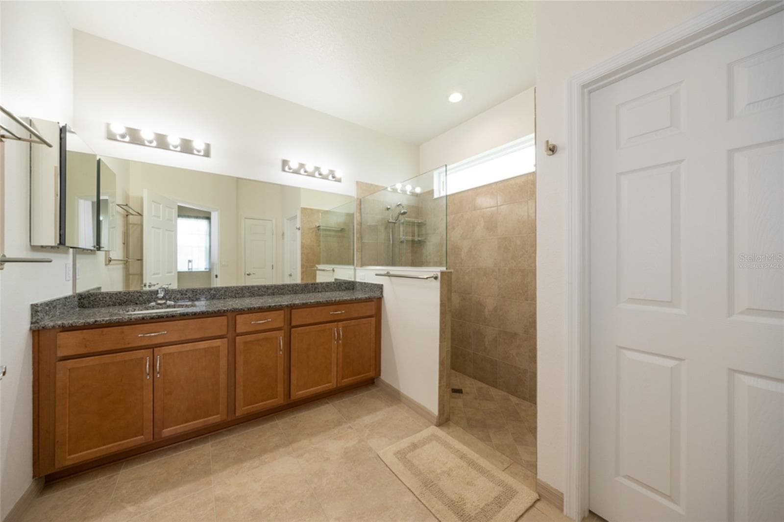 Virtually staged primary bath - 85 S CIMMARON DR, PALM COAST