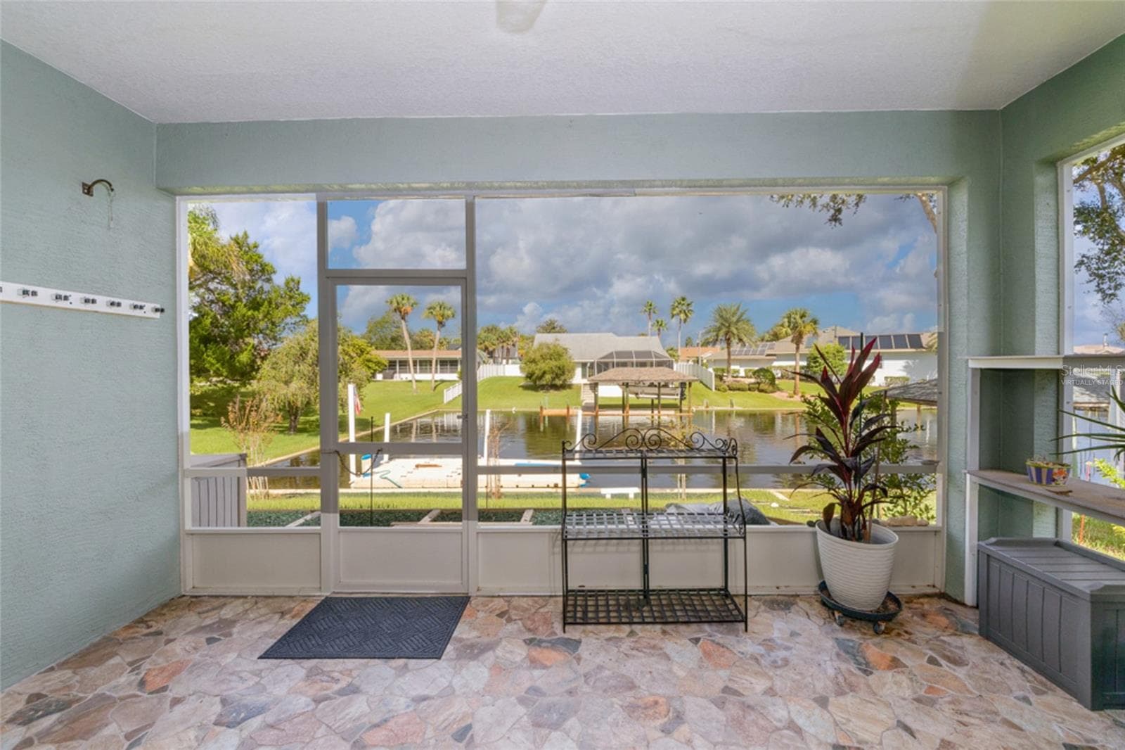 virtually staged lanai - 85 S CIMMARON DR, PALM COAST