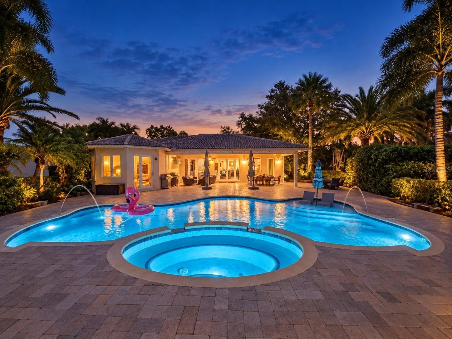 night photo with landscape lighting - 3800 SW 137TH AVE, MIRAMAR