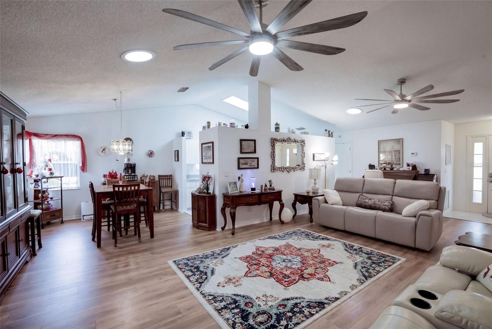 View into the Living and Dining Rooms - 26162 NEWCOMBE CIR, LEESBURG