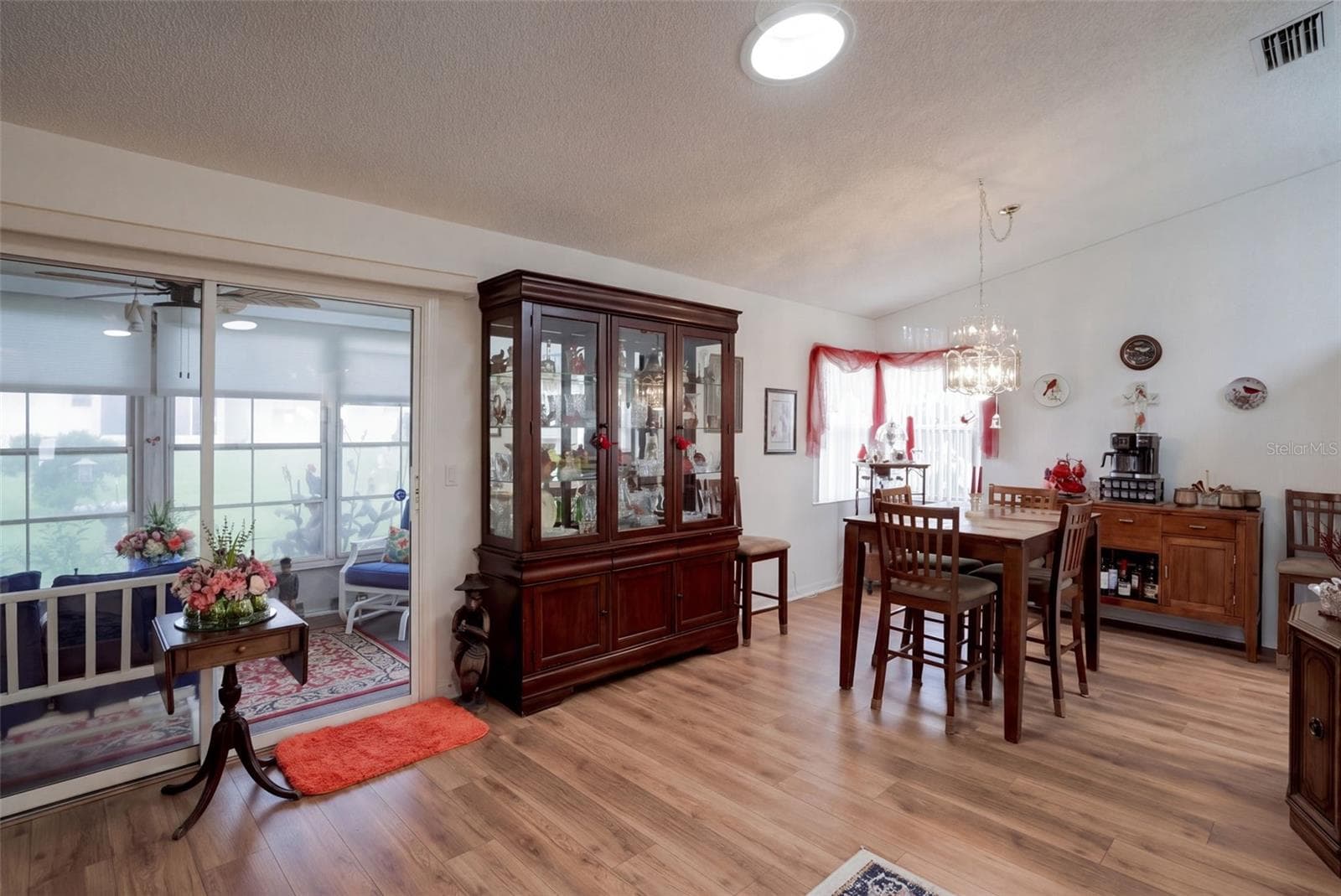 View of the Dining Room and Lanai - 26162 NEWCOMBE CIR, LEESBURG