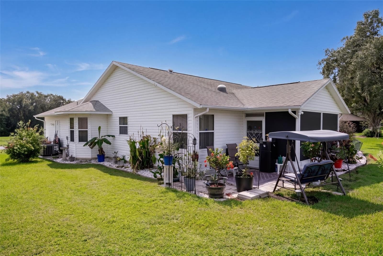View of home from the back yard. - 26162 NEWCOMBE CIR, LEESBURG