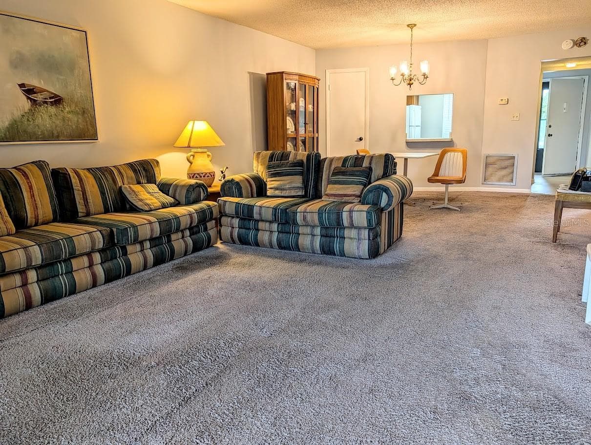 Living / dining room - 8765 BARDMOOR BLVD #207, SEMINOLE