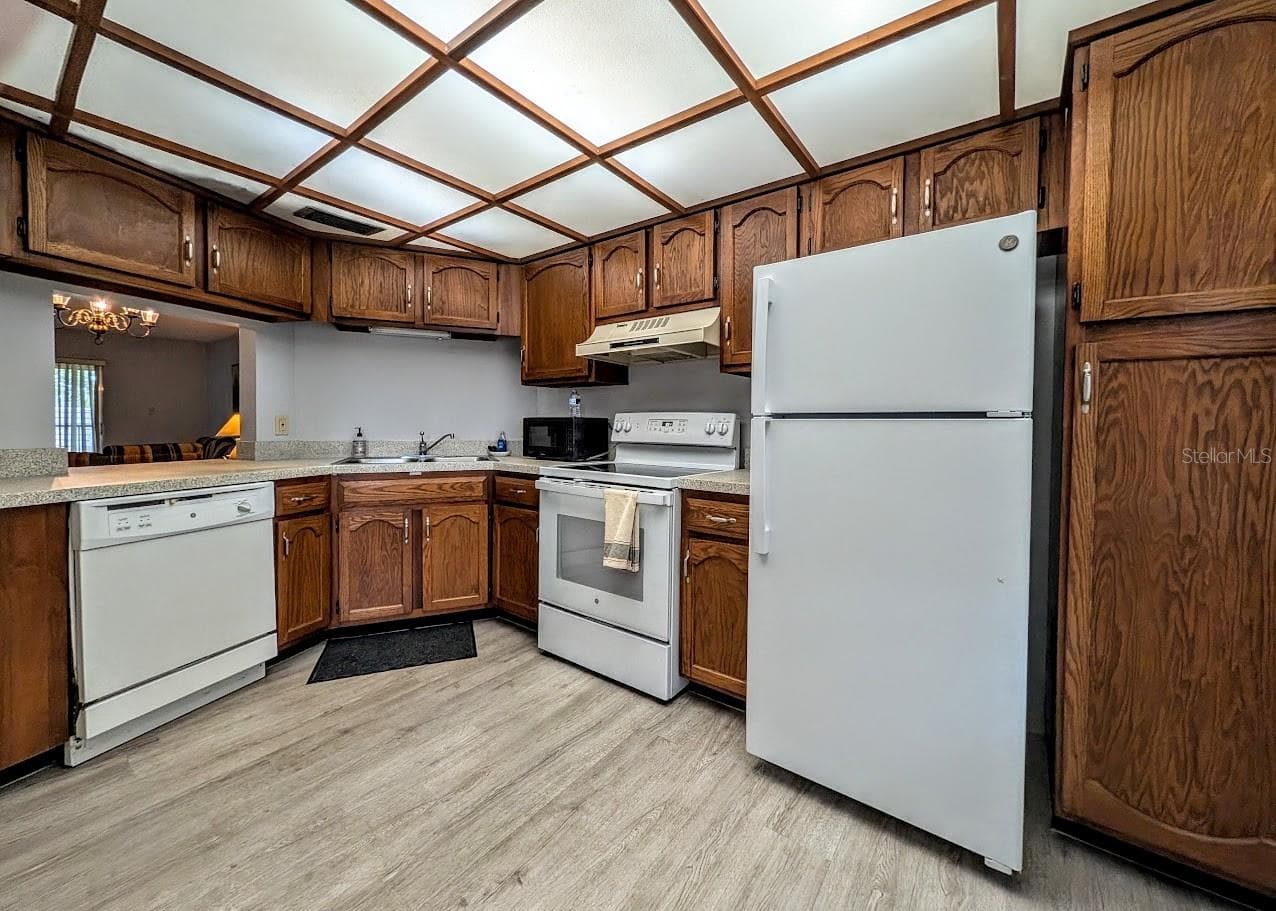 Kitchen with pantry - 8765 BARDMOOR BLVD #207, SEMINOLE