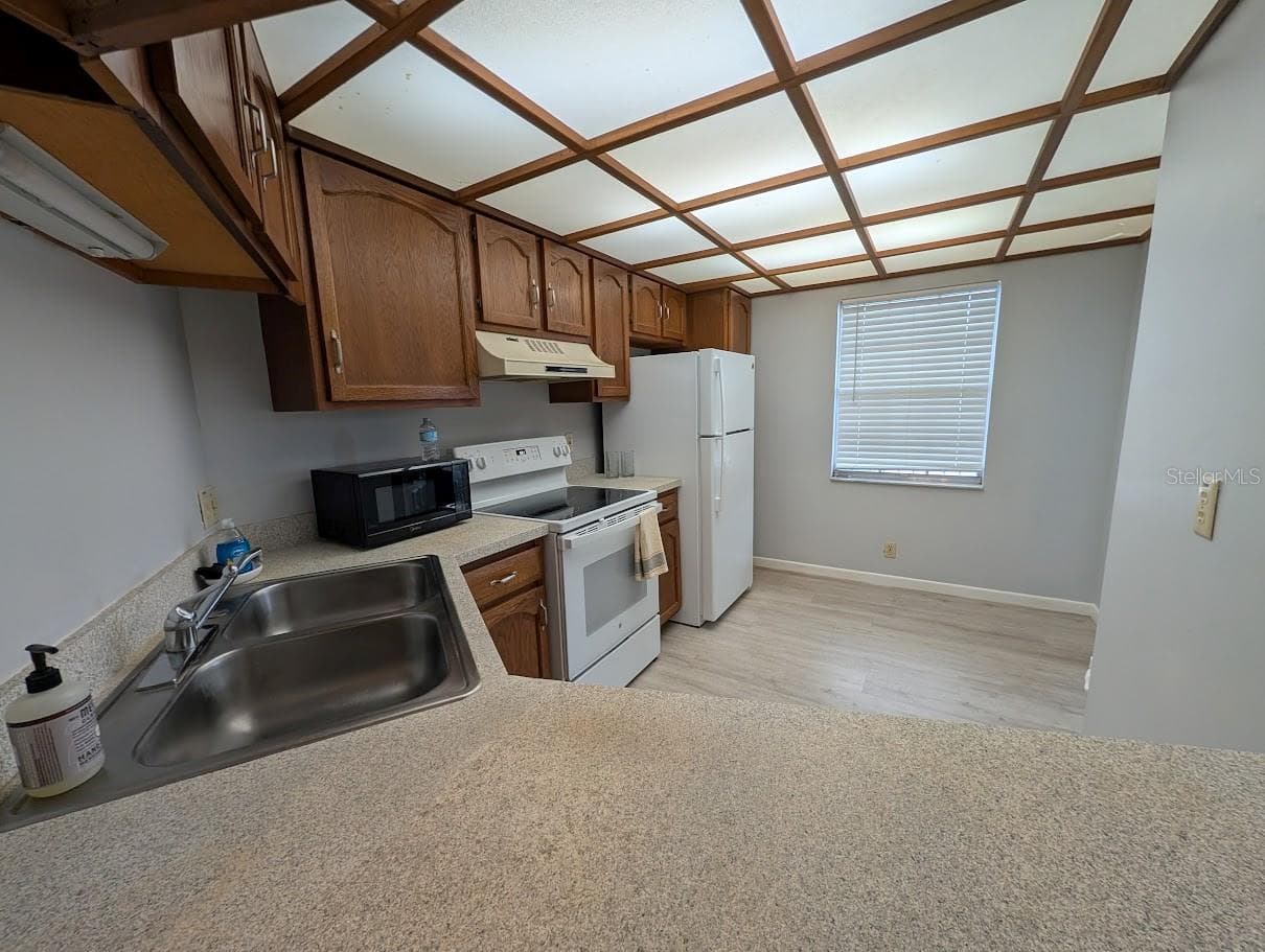 Kitchen with eat in area - 8765 BARDMOOR BLVD #207, SEMINOLE