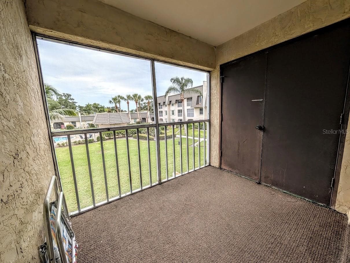 Screened lanai with laundry closet - 8765 BARDMOOR BLVD #207, SEMINOLE