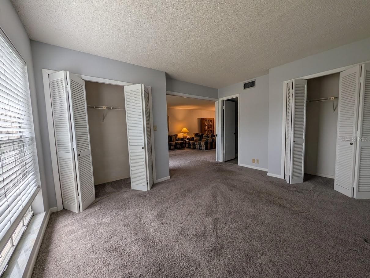 2nd bedroom with entry to living area and 2nd bath - 8765 BARDMOOR BLVD #207, SEMINOLE