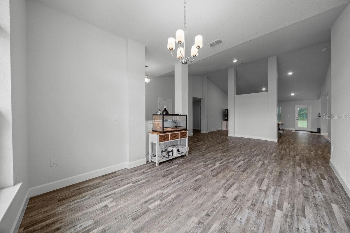 formal dining room and living room - 140 NW 113TH CIR, OCALA
