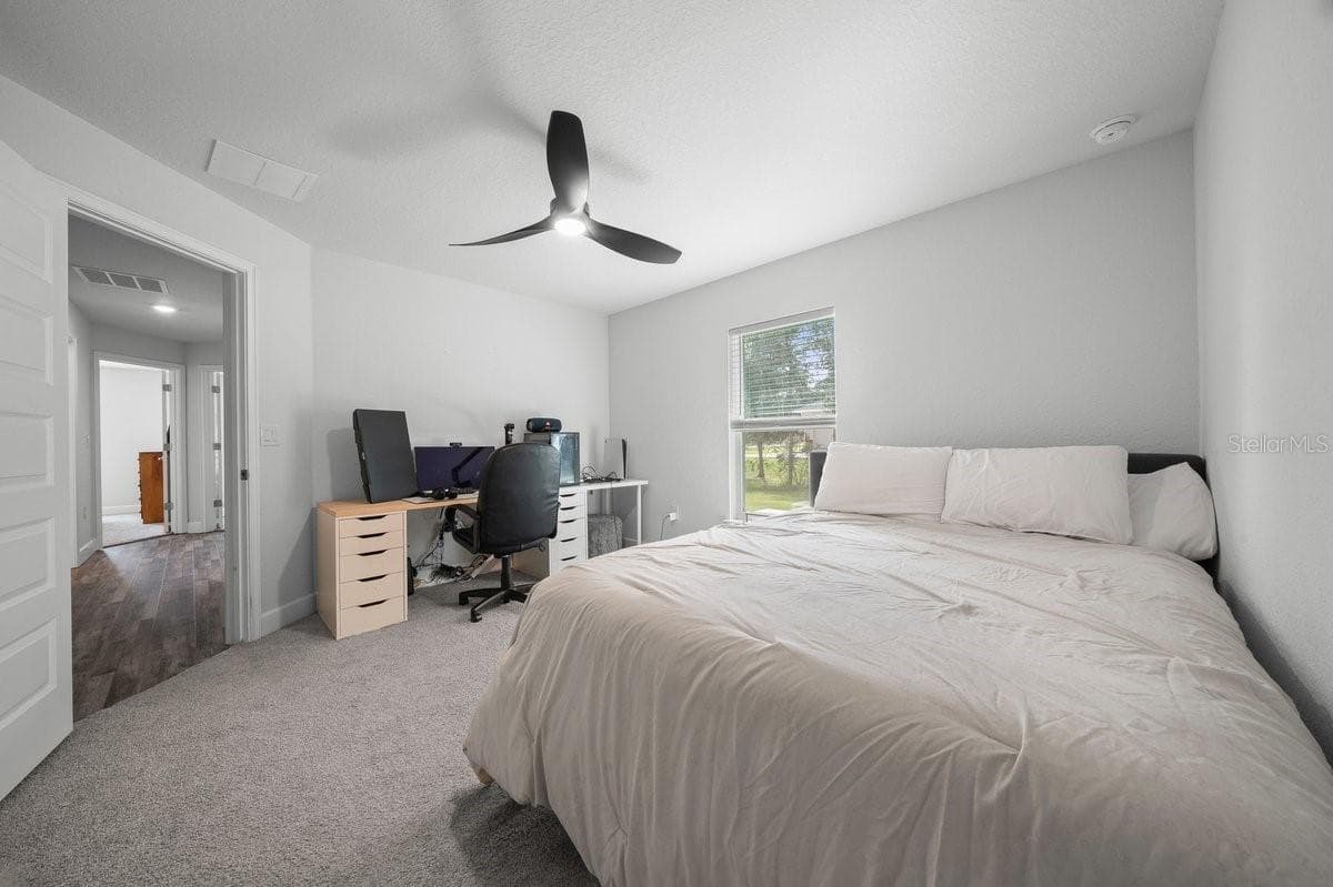 First bedroom - 140 NW 113TH CIR, OCALA