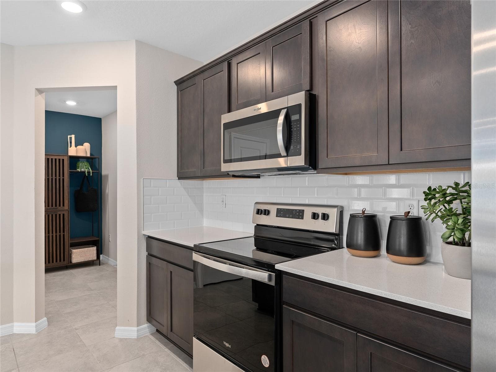 Model Home Design Only. Pictures and furnishings are for illustrative purposes only. Elevations, colors and options may vary. Furniture is for model home staging only. - 16821 EVERMORE ALLEY, WINTER GARDEN