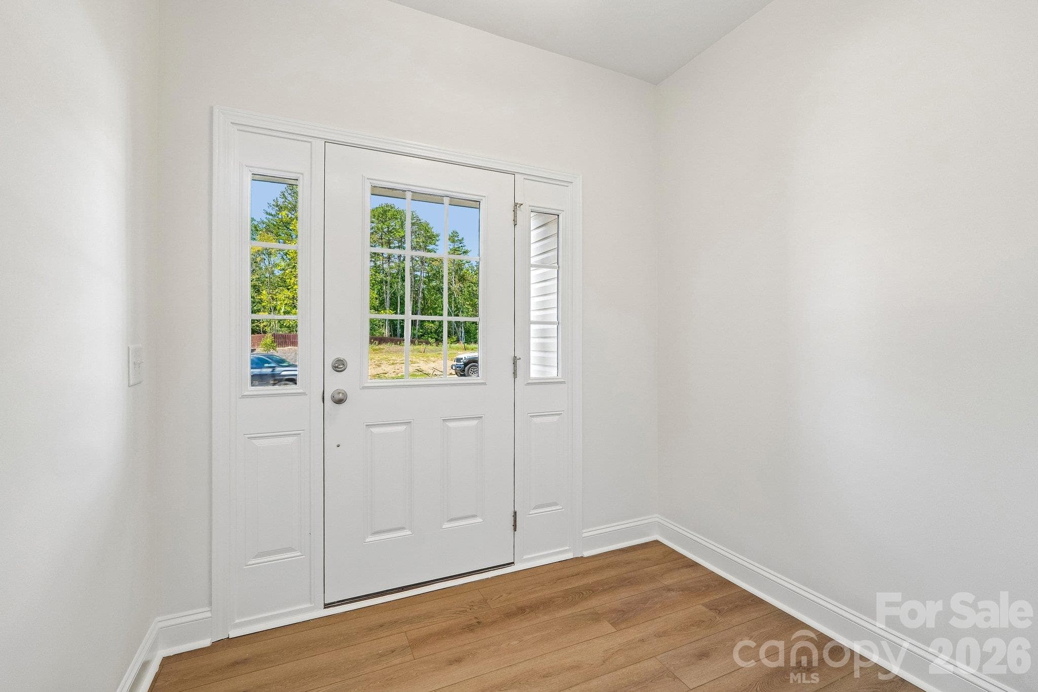 Bright entry space with natural light and easy-care flooring. - Bell Glen, Charlotte