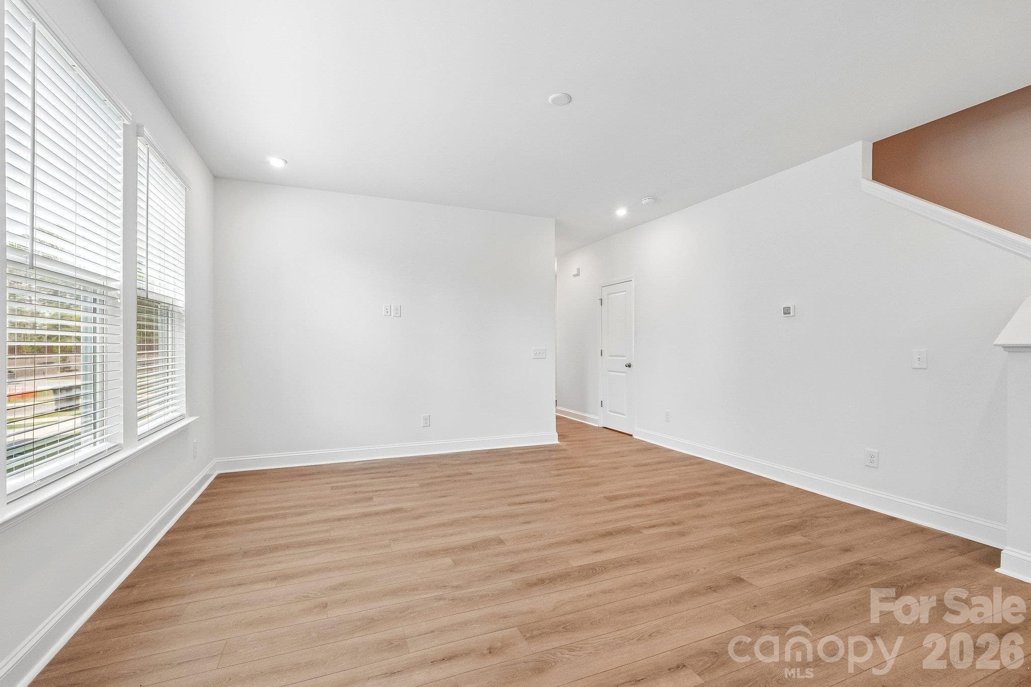 Sunlit living space ready for your personal touch. - Bell Glen, Charlotte
