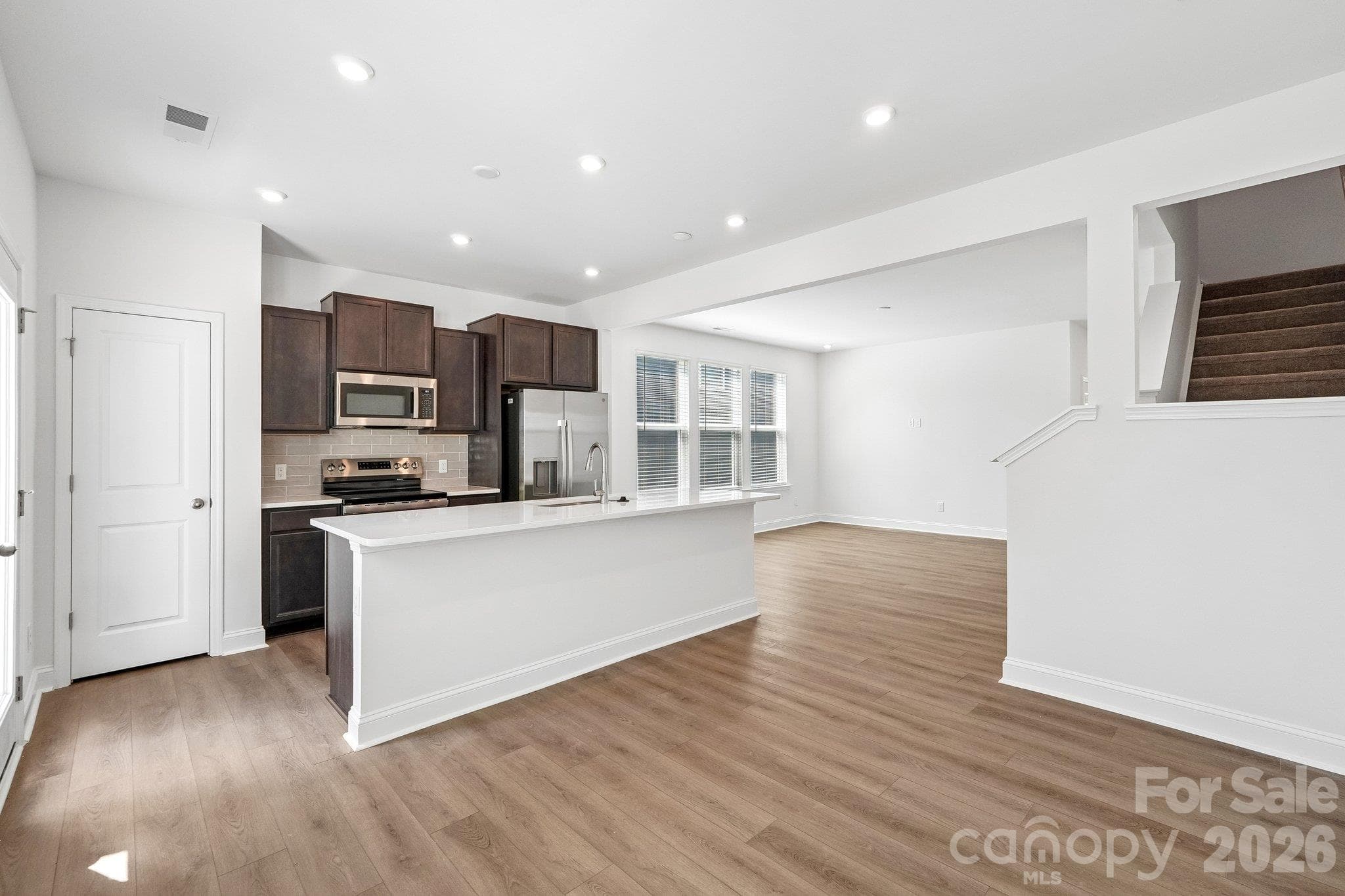 Spacious kitchen with a large island. - Bell Glen, Charlotte