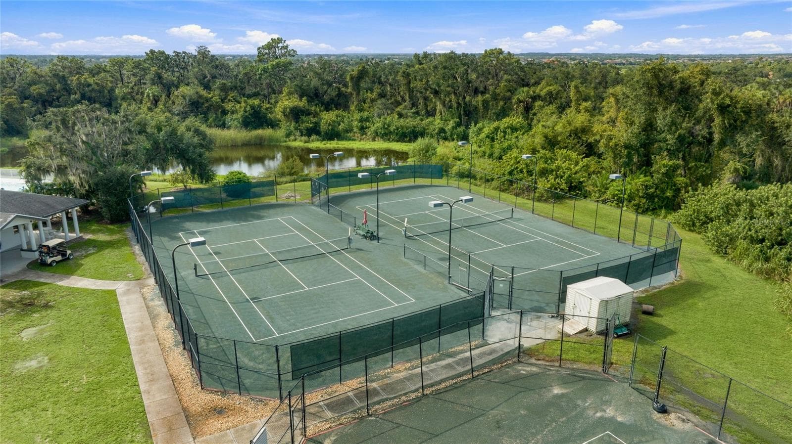 Lighted tennis center at River Wilderness - 3306 LITTLE COUNTRY RD, PARRISH