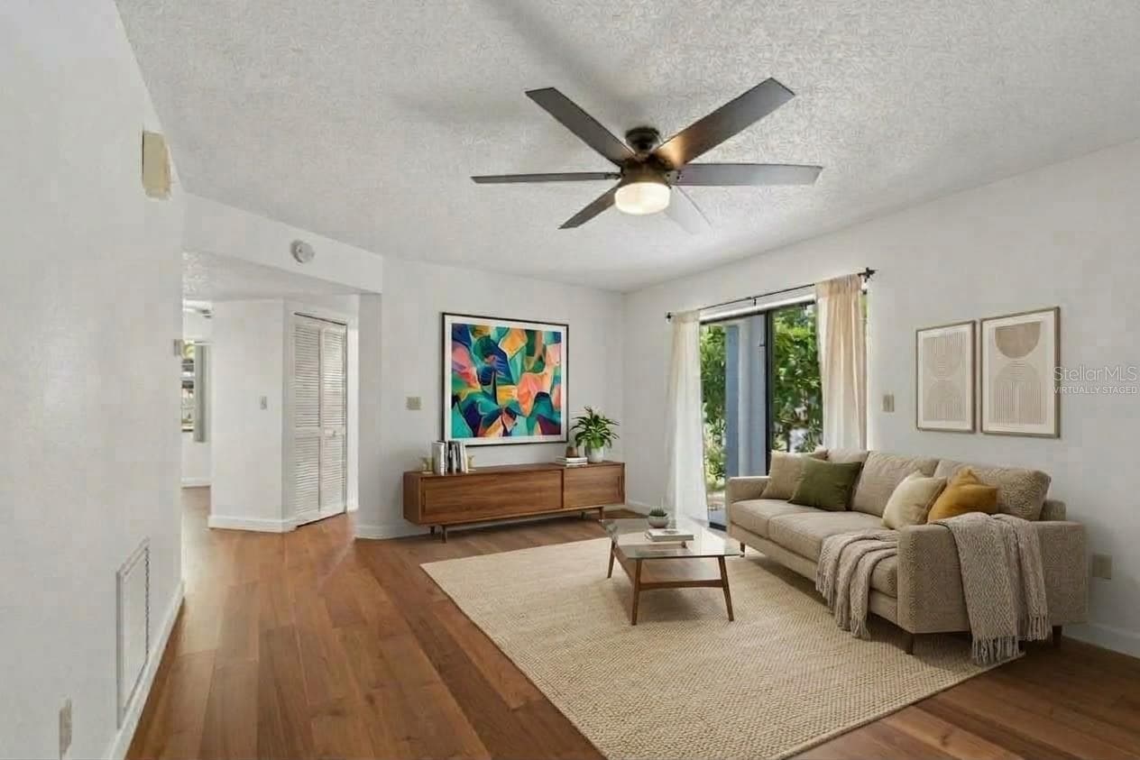 Virtually Staged Living Room - 11800 PARK BLVD #401, SEMINOLE