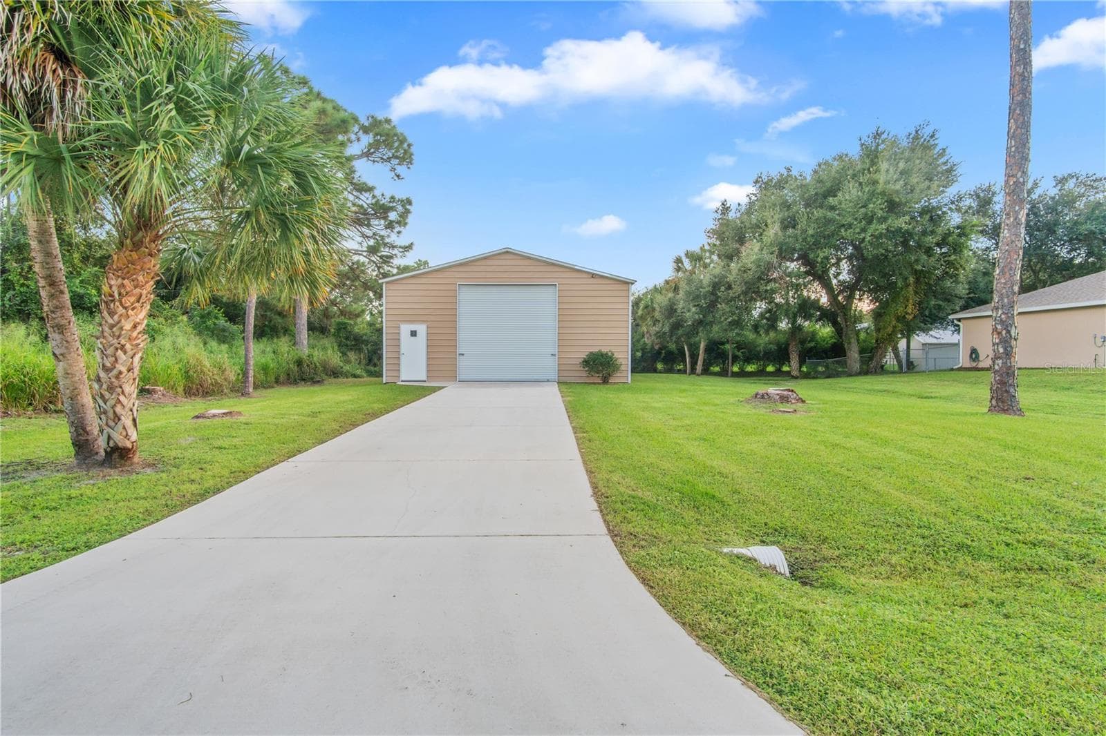 Driveway to detached garage - 17433 HARRIS AVE, PORT CHARLOTTE