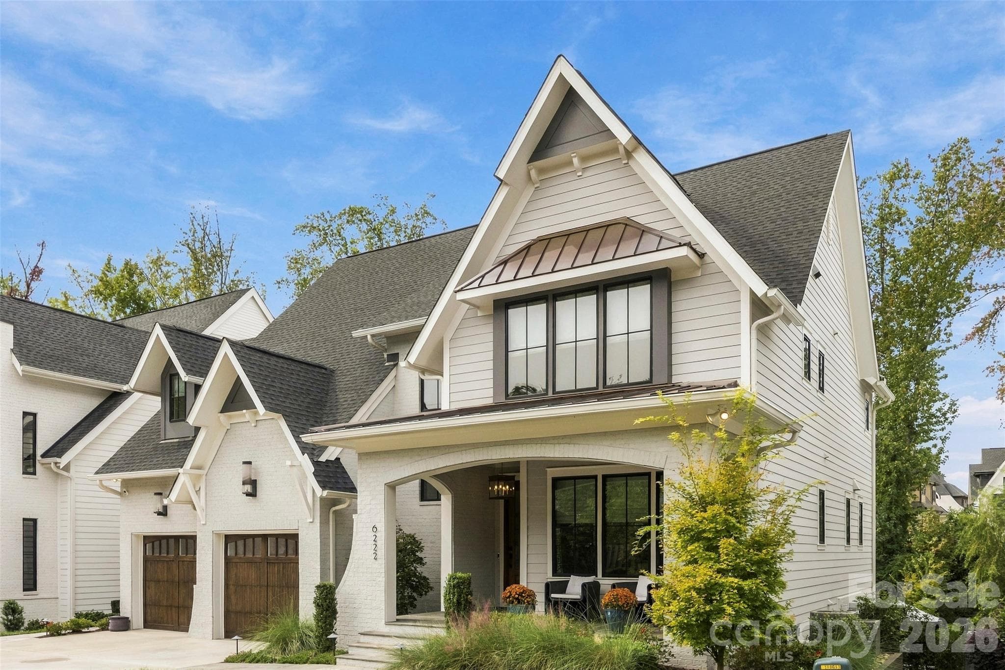 Copper roof over blue stone front porch - 6222 Louis Patrick Lane, Charlotte
