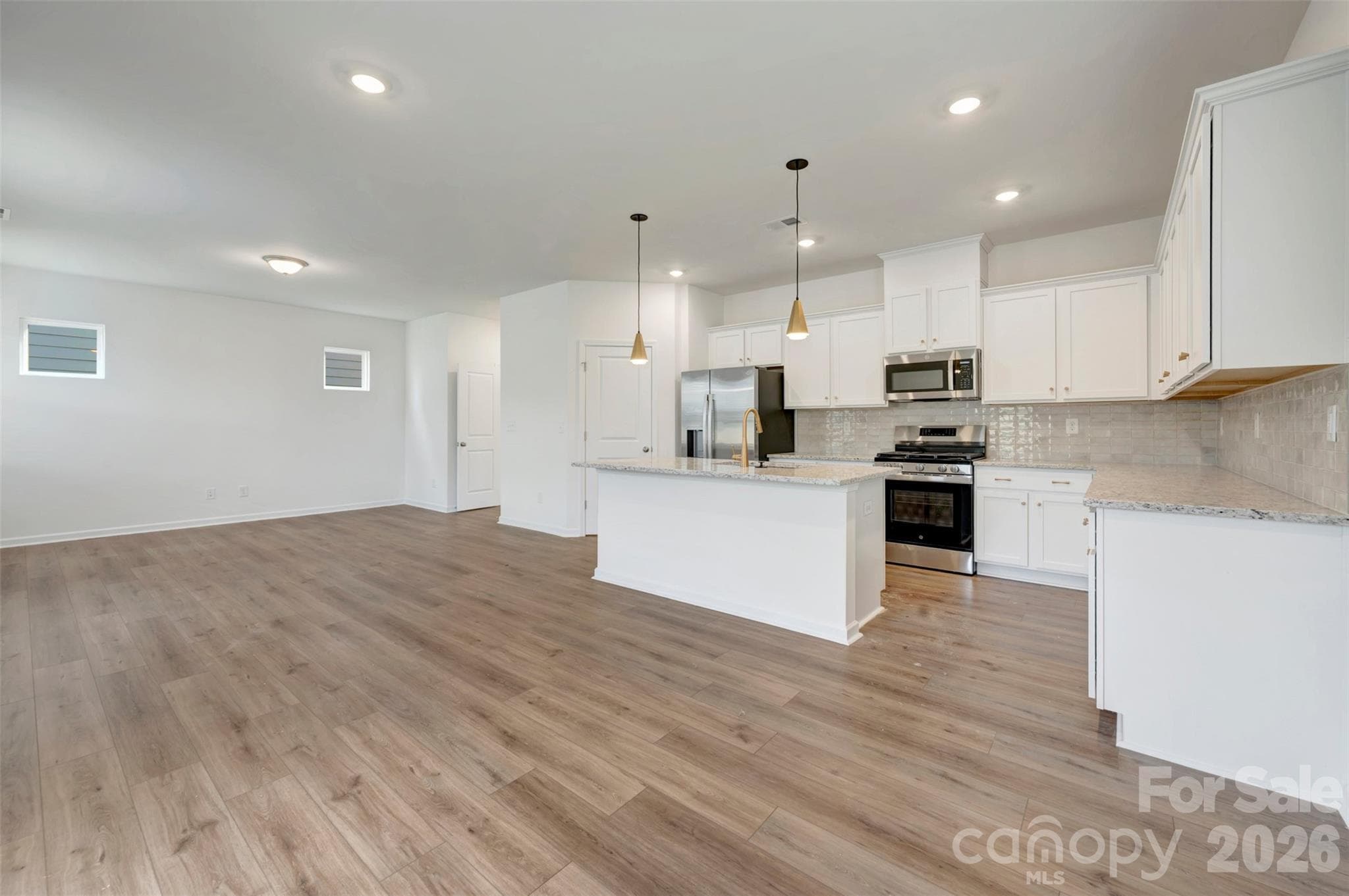 Kitchen and family room - 1529 Kate Cecil Way, York