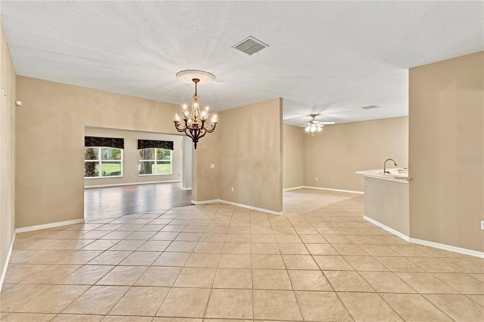 Living room W/ Tile on the Diagonal - 352 HAMRICK DR, POINCIANA