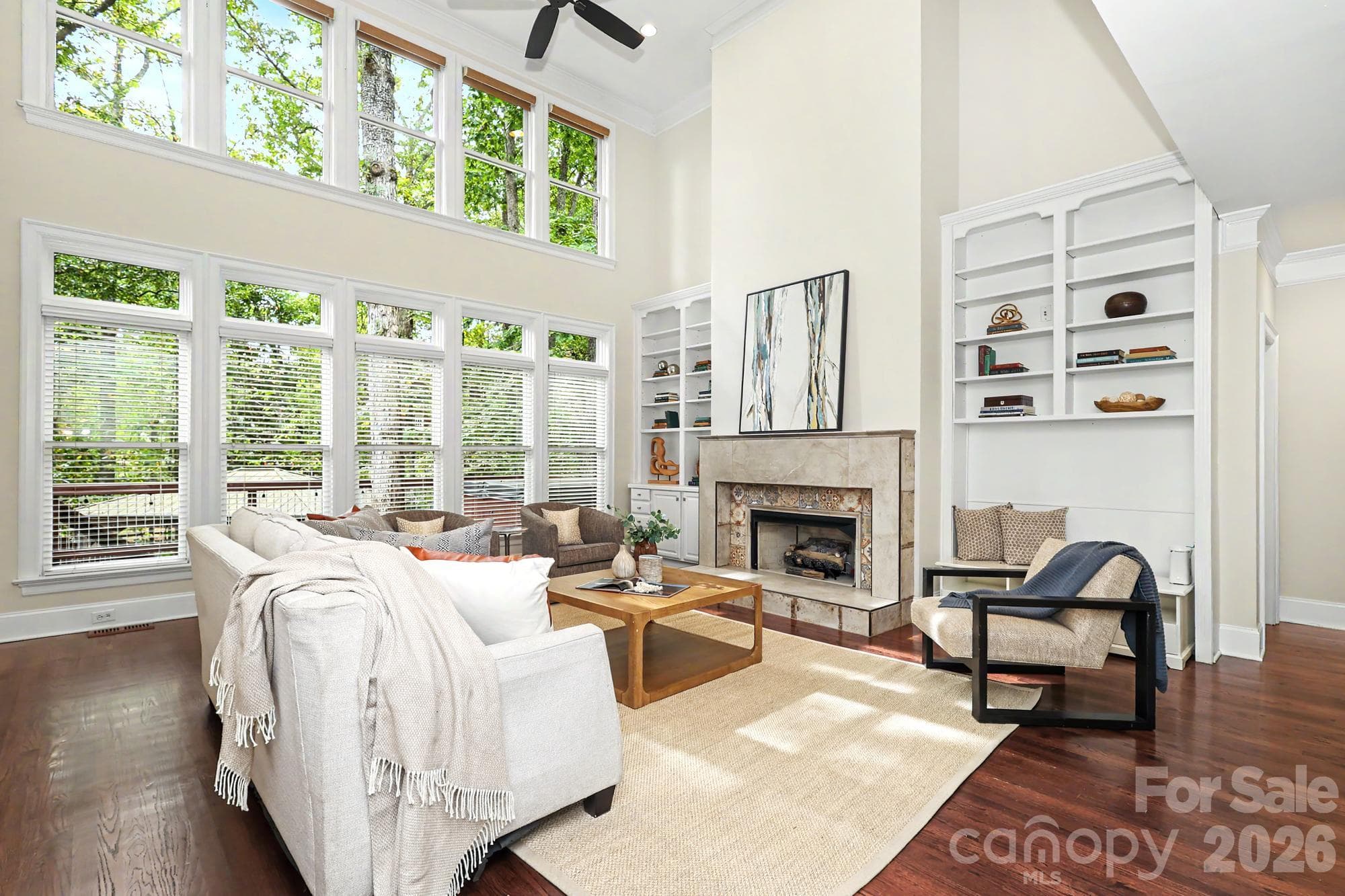 Gorgeous family room with soaring ceilings and views to the private rear yard - 4320 Town And Country Drive, Charlotte