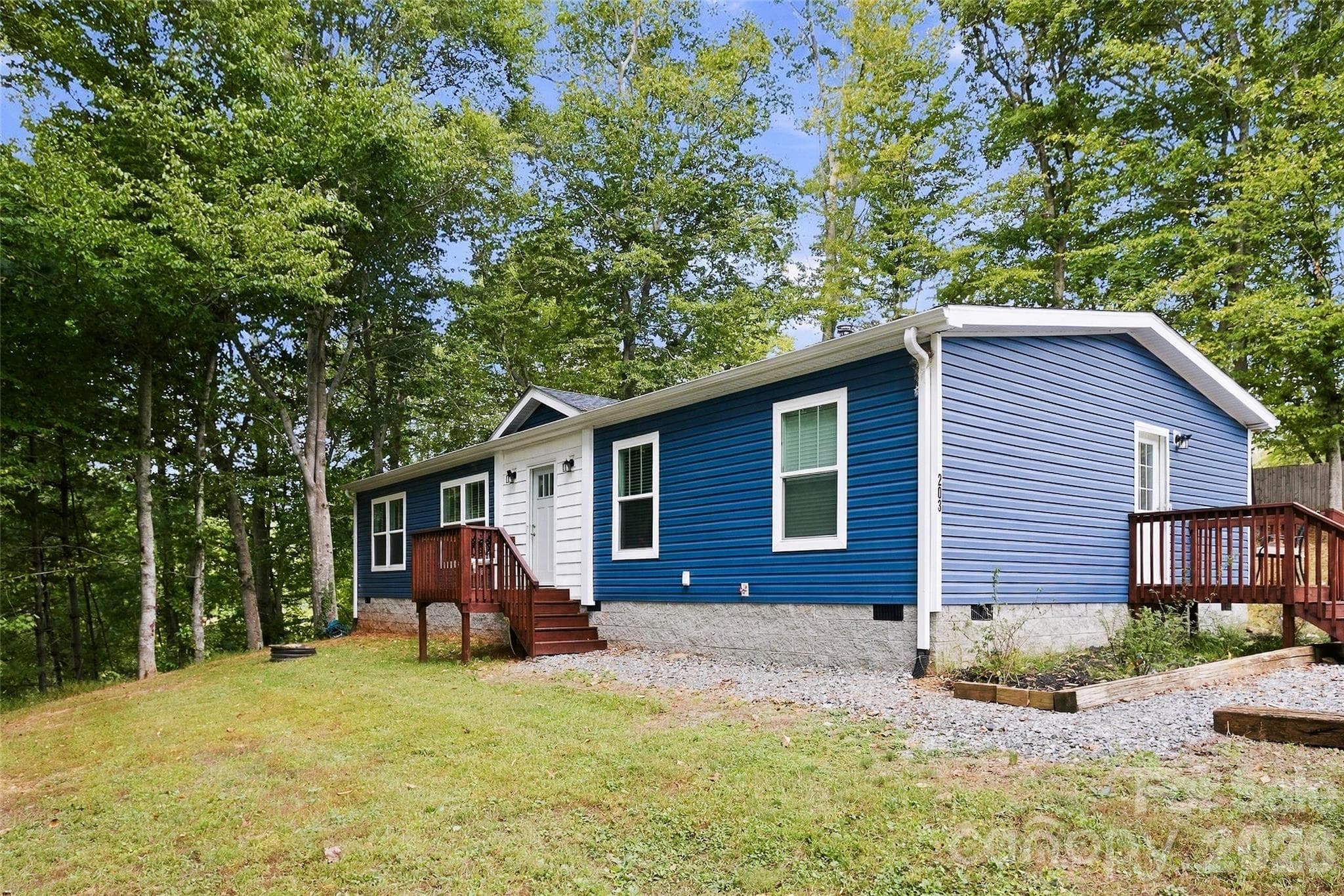 Single Family Residence at 203 Beaverdam Loop Road, Candler, photo 3 of 47