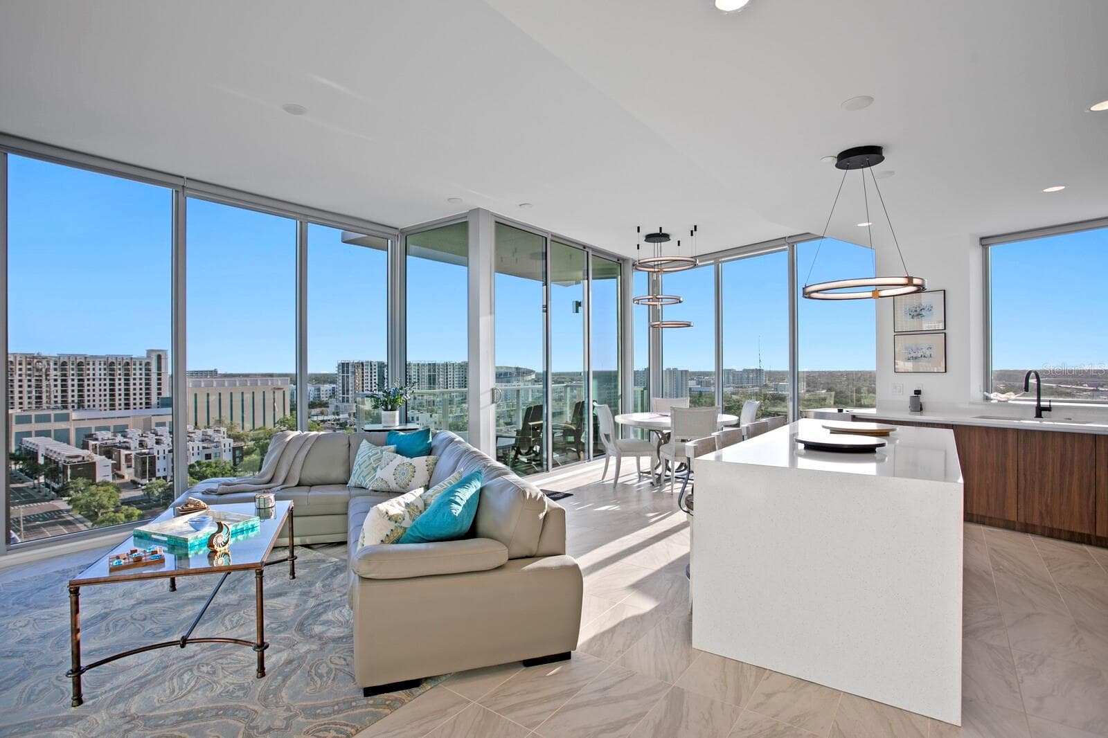 Great Room Living and Dining Room and Kitchen with floor to ceiling windows. - 777 3RD AVE N #1408, ST PETERSBURG