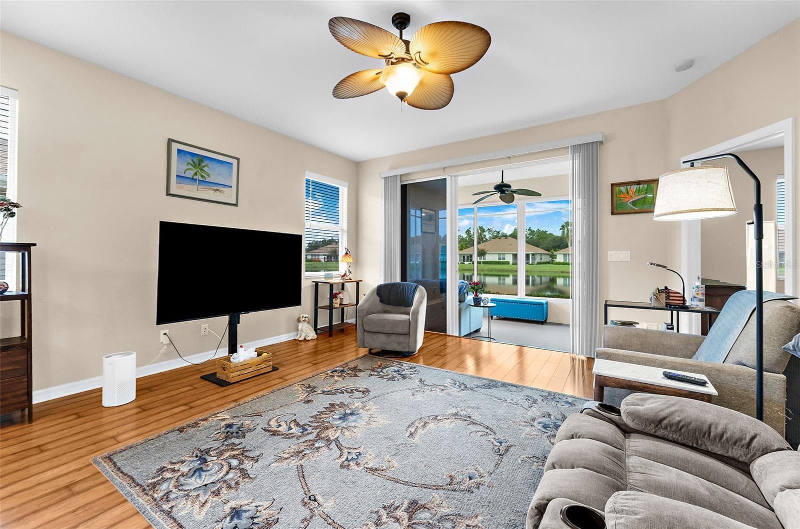 Living room to lanai - 2491 COTTONWOOD LN, NORTH PORT