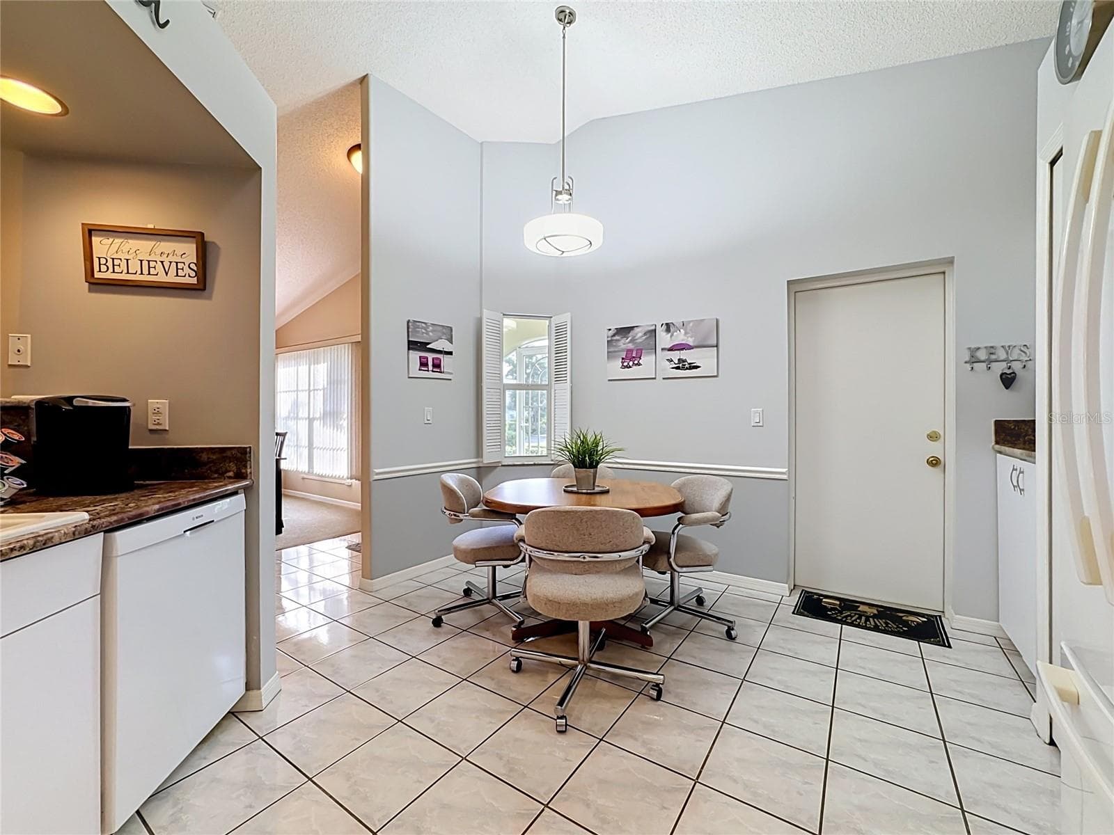 Kitchen with door to garage - 4547 FERN DR, BRADENTON