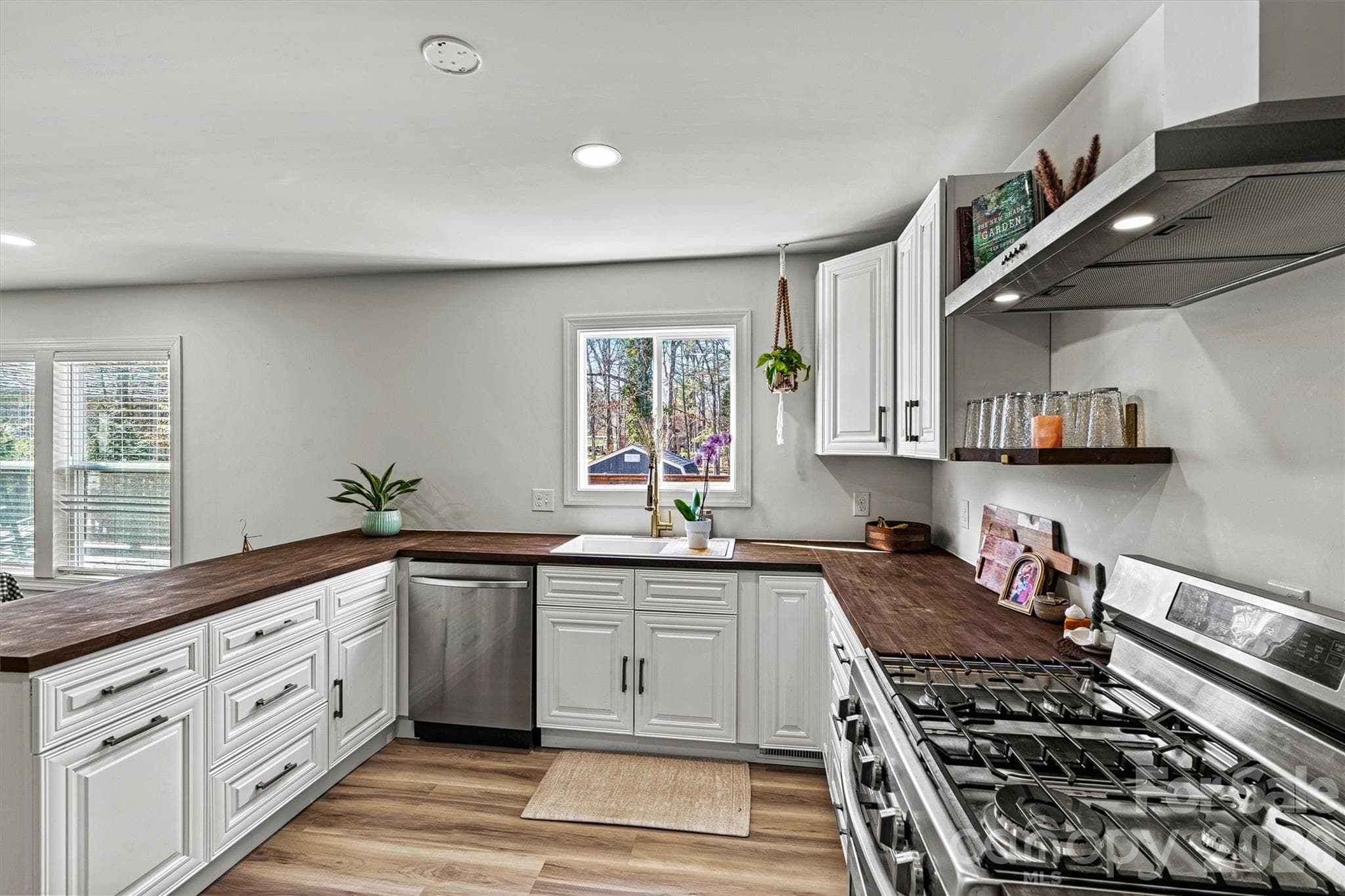 All new stainless appliances and gas top stove - 3995 Burton Lane, Denver