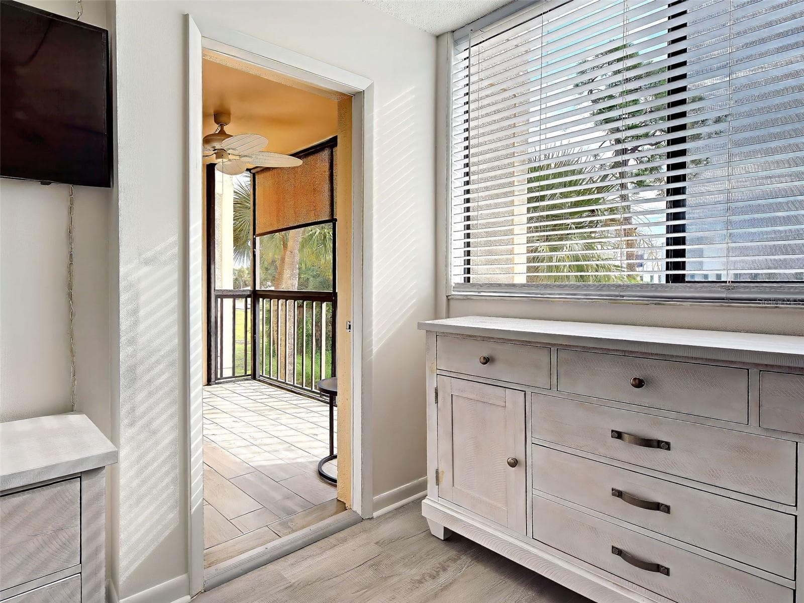 PRIMARY BEDROOM ACCESS TO LANAI - 3006 CARING WAY #310, PORT CHARLOTTE